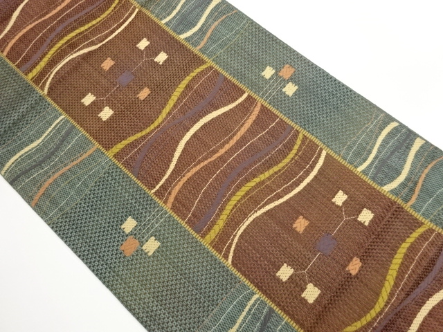 Honjo Chikuzen Hakata shikishi, woven Nagoya obi with striped pattern on variega